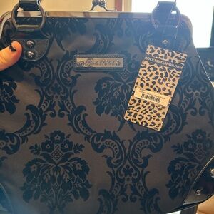 Rock rebel purse never used